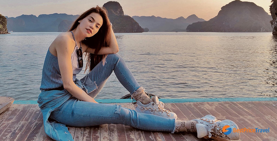 Try new pose for taking beautiful photo in Halong Bay