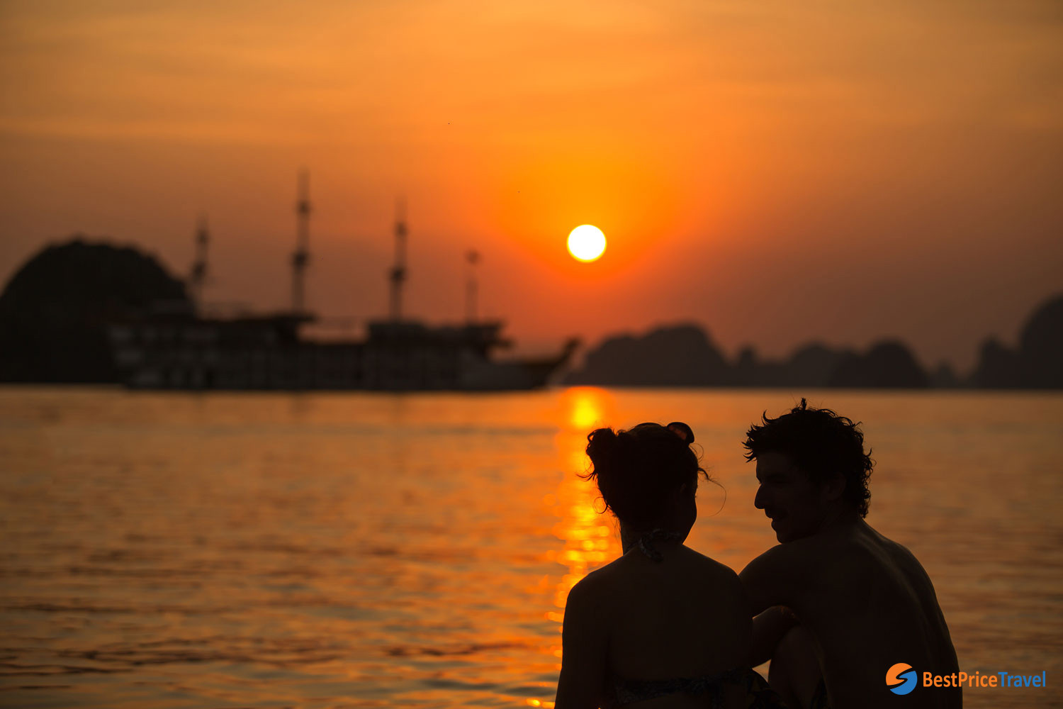 Sunset photo of a couple in Halong Bay