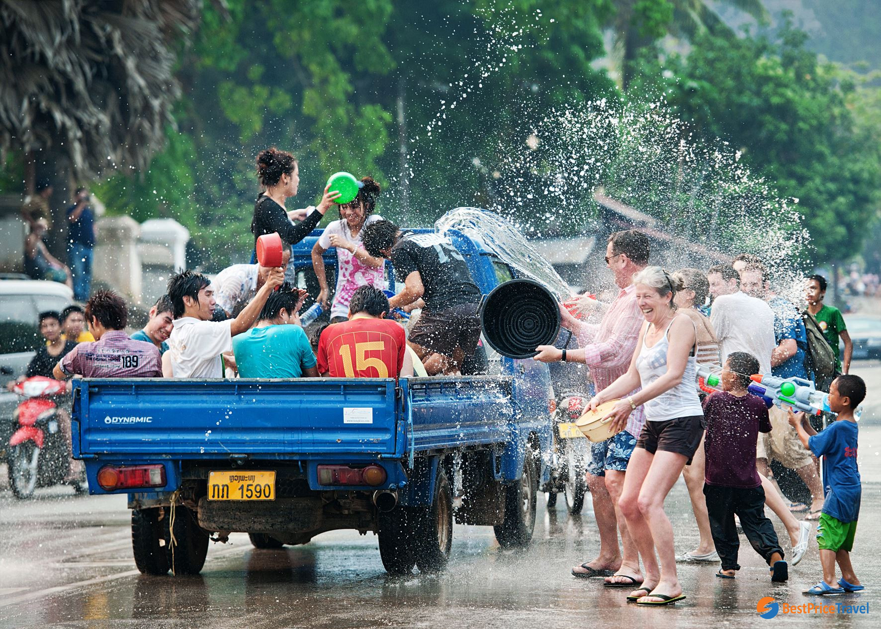 plashing water is considered as a must-do activities giving good luck in Boun Pi Mai