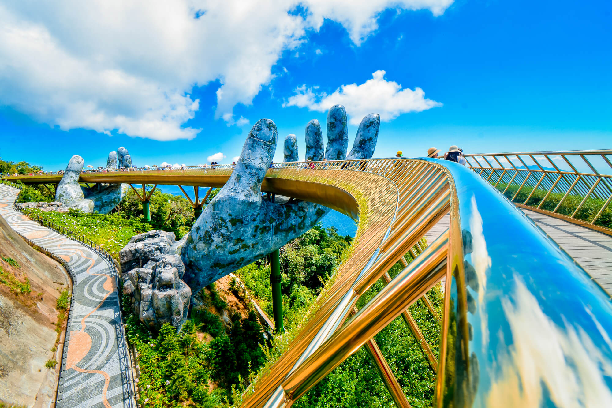 Take pictures at Golden Bridge in Danang