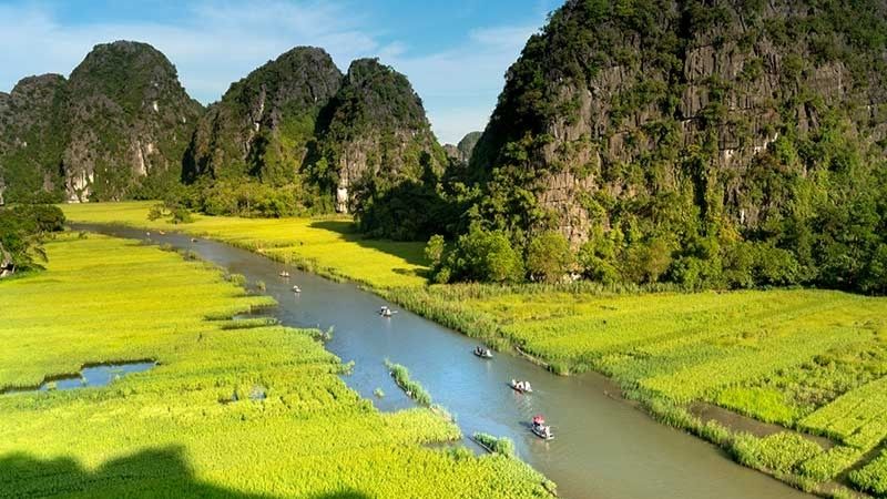 Boat riding along Ngo Dong River