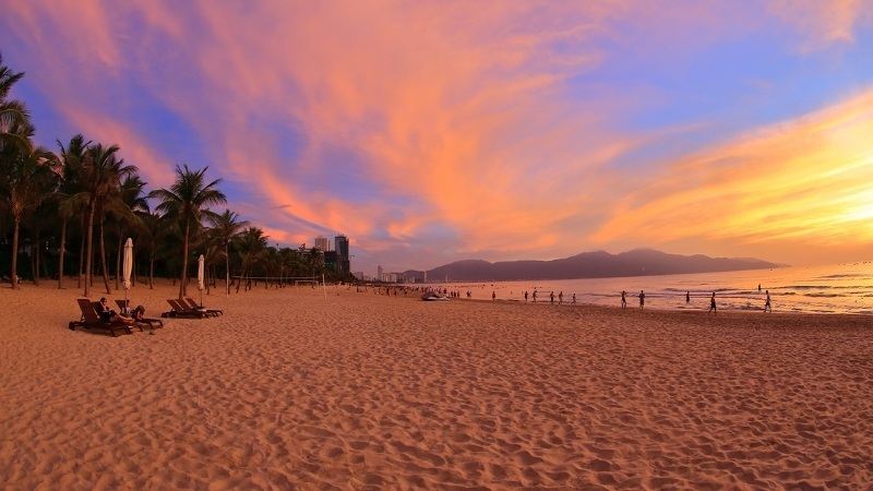 Get up early to see the sunrise on the beach