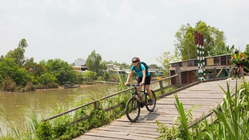 Cycling through local village in Mekong delta