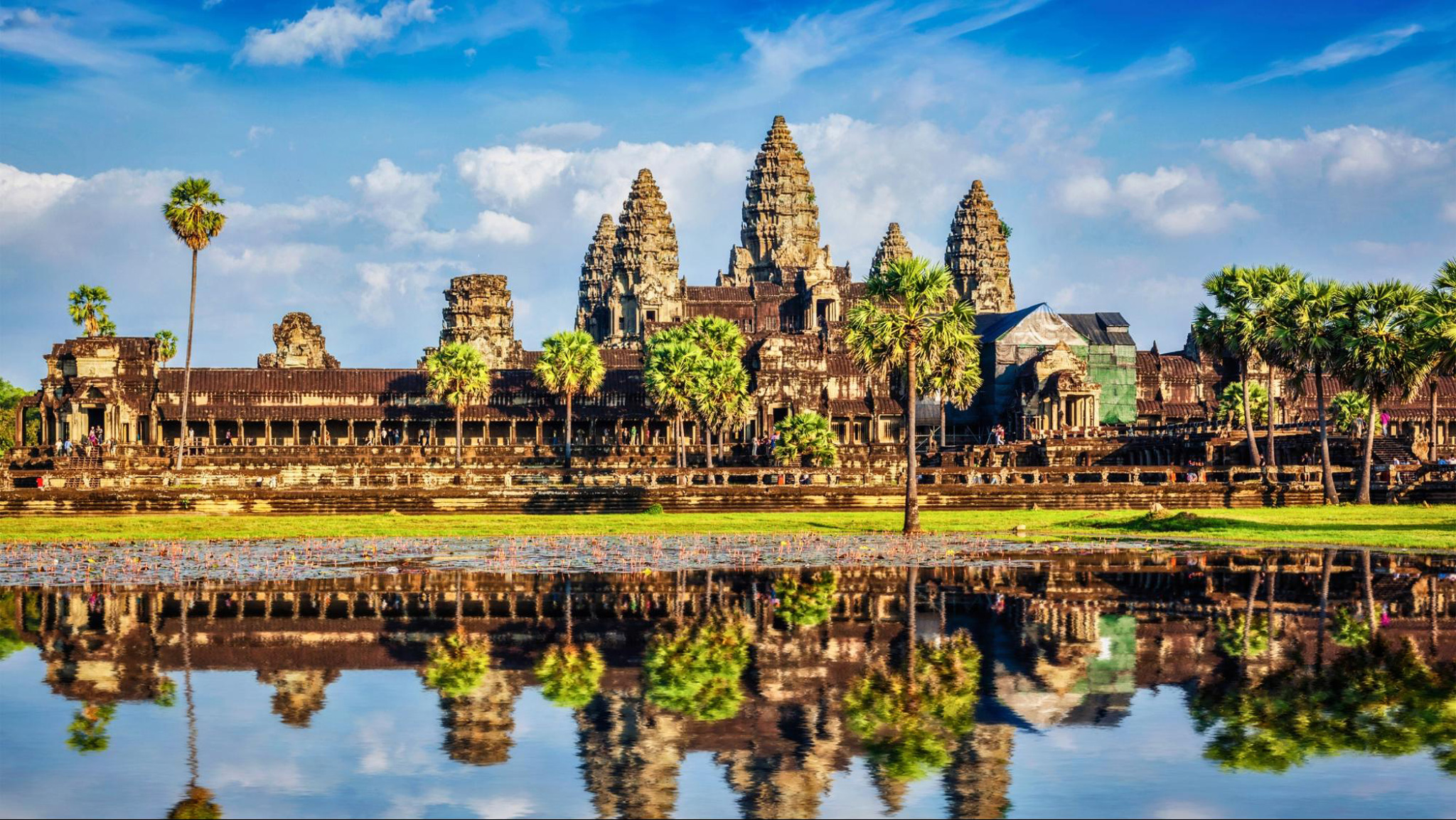 Angkor Wat looks beautiful with the bright sunset shining on it