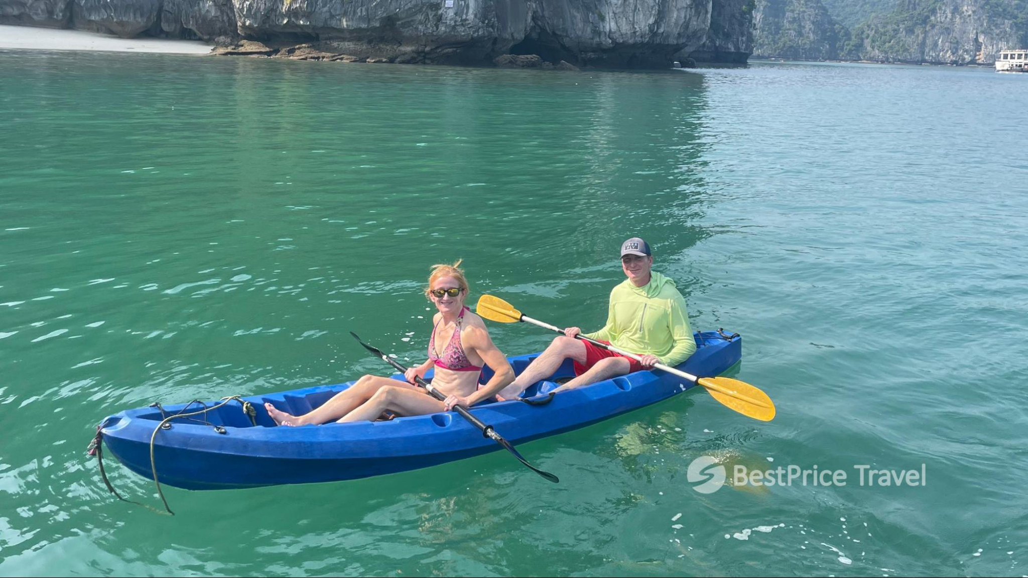 Kayak on the emerald water surrounded by unique limestones