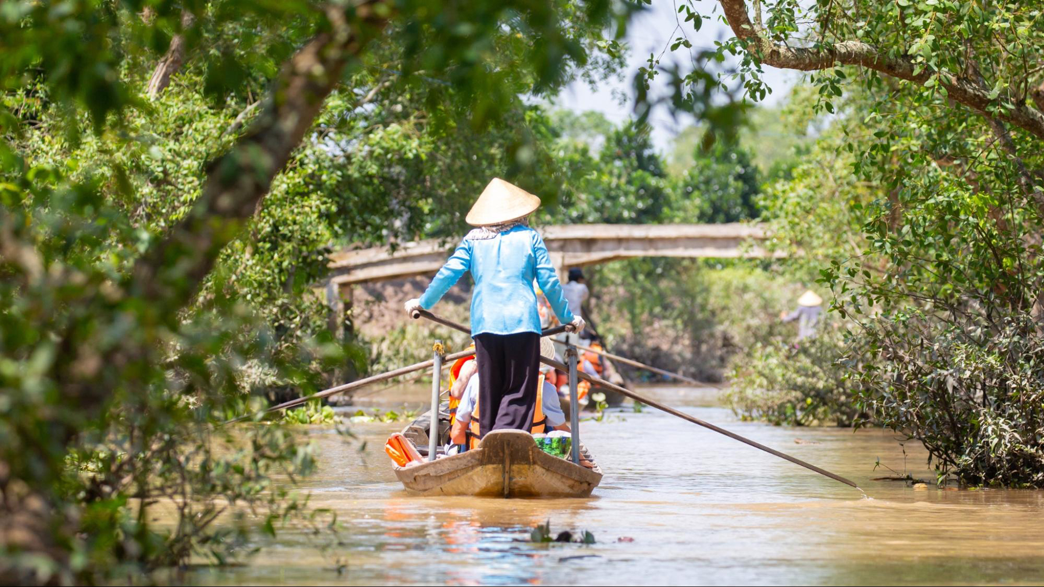 Journey through the peaceful canals of Mekong Delta on a sampan