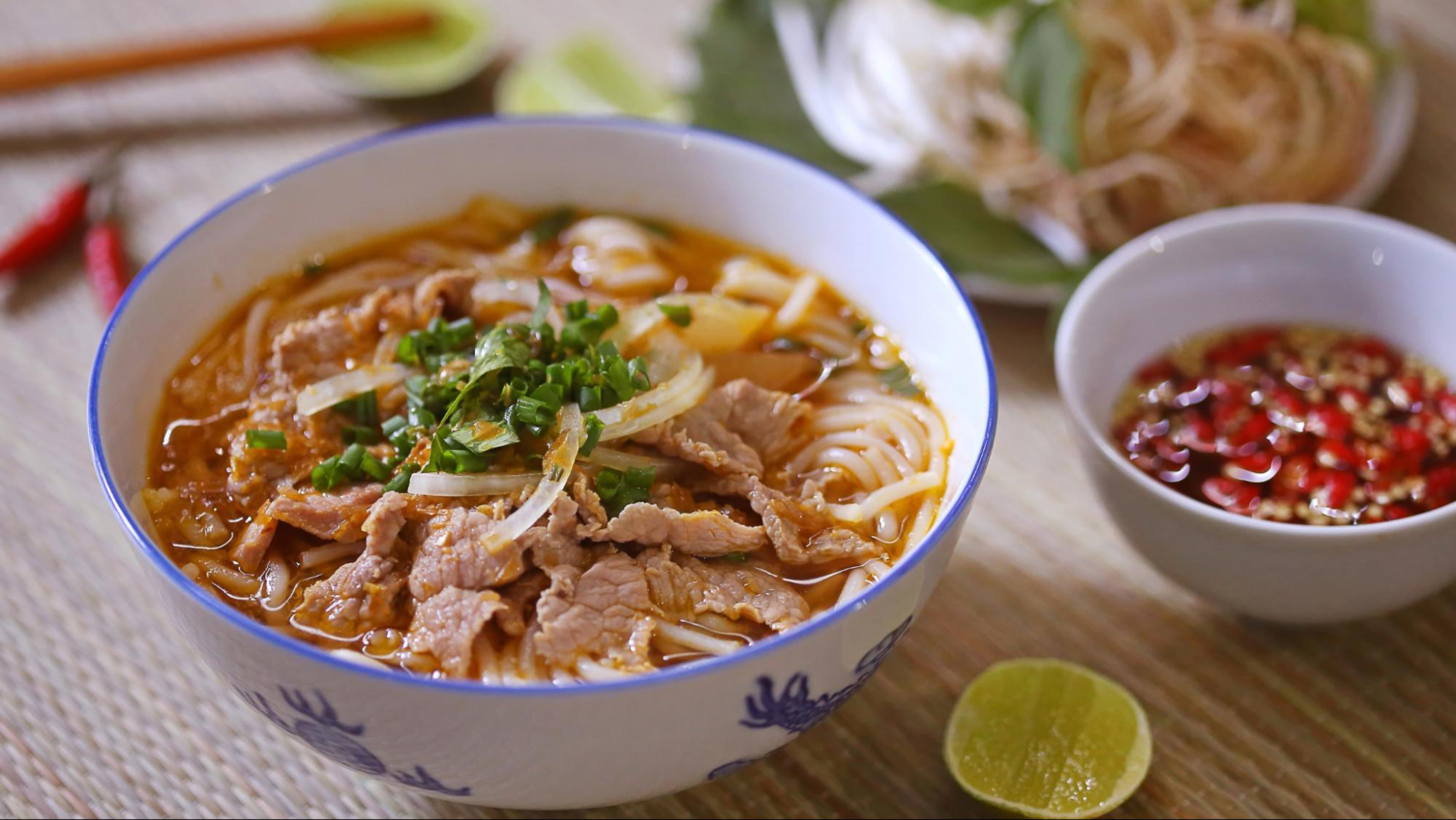 The bold and fragrant broth of Bun Bo Hue is the star of this dish