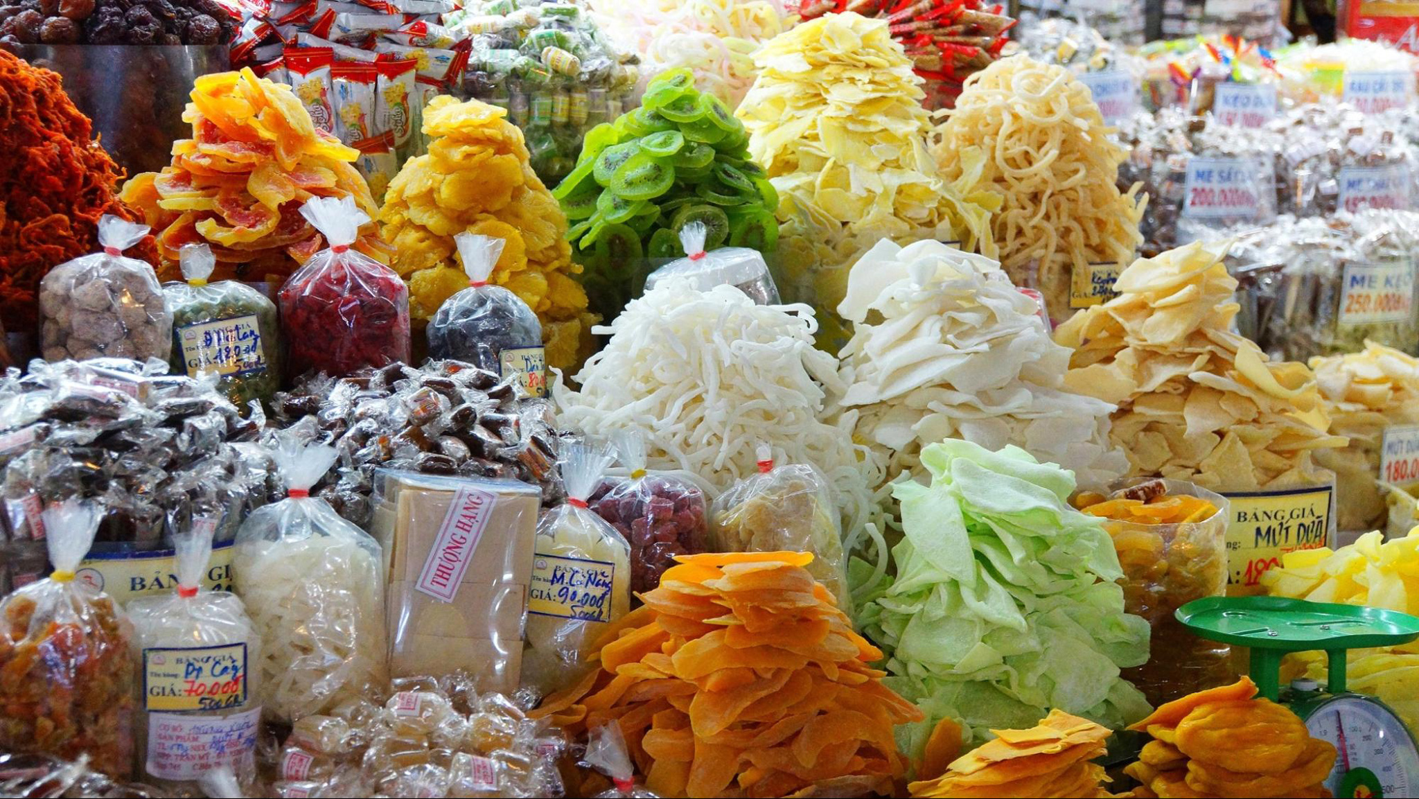 Shop for various kinds of local snacks at Ben Thanh Market