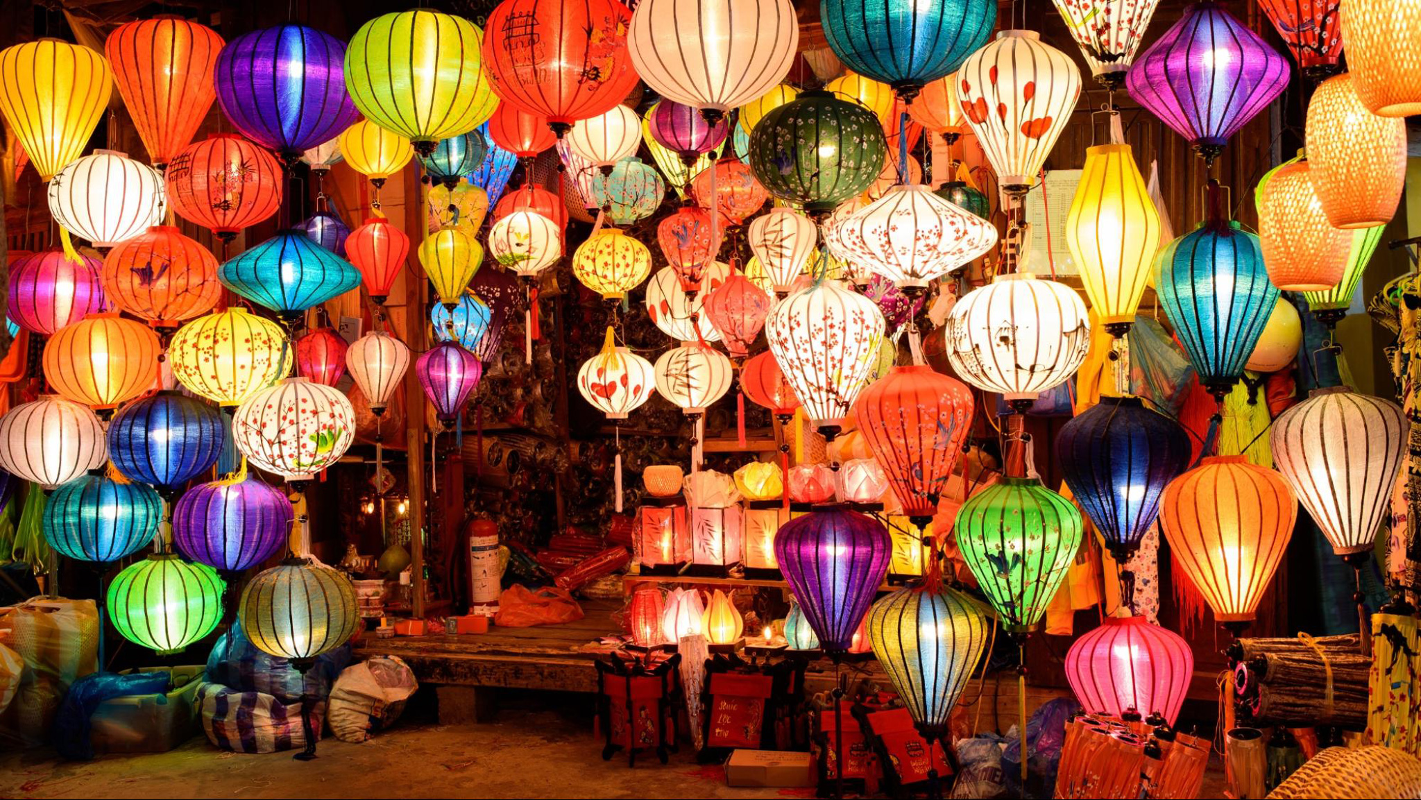Lantern-lit streets create a magical atmosphere at night in Hoi An