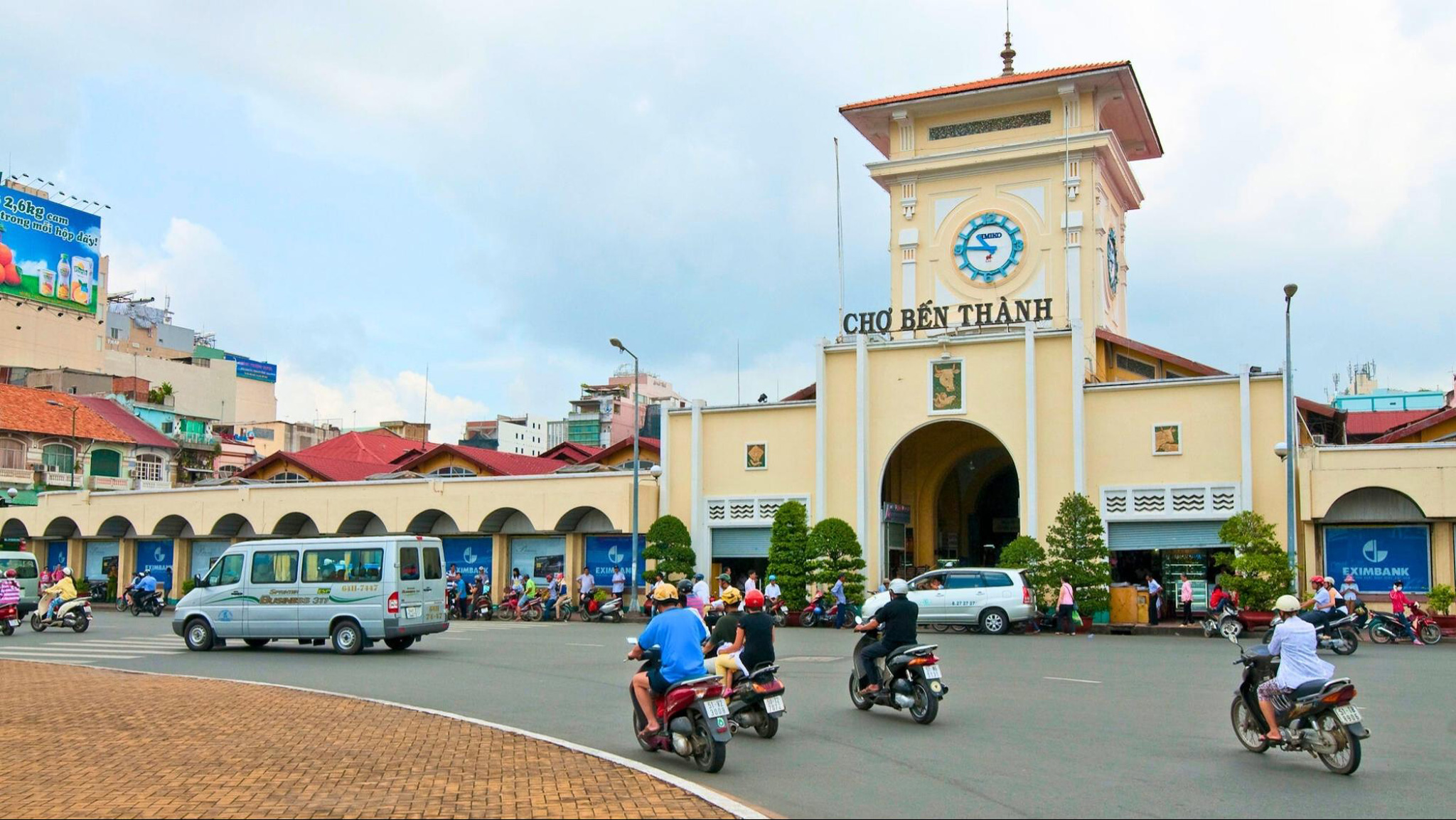 Shop for local crafts and street food at Ben Thanh Market