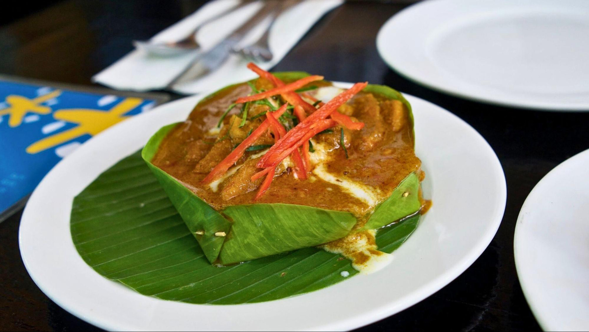 Enjoy the rich flavors of fish amok at Friends the Restaurant