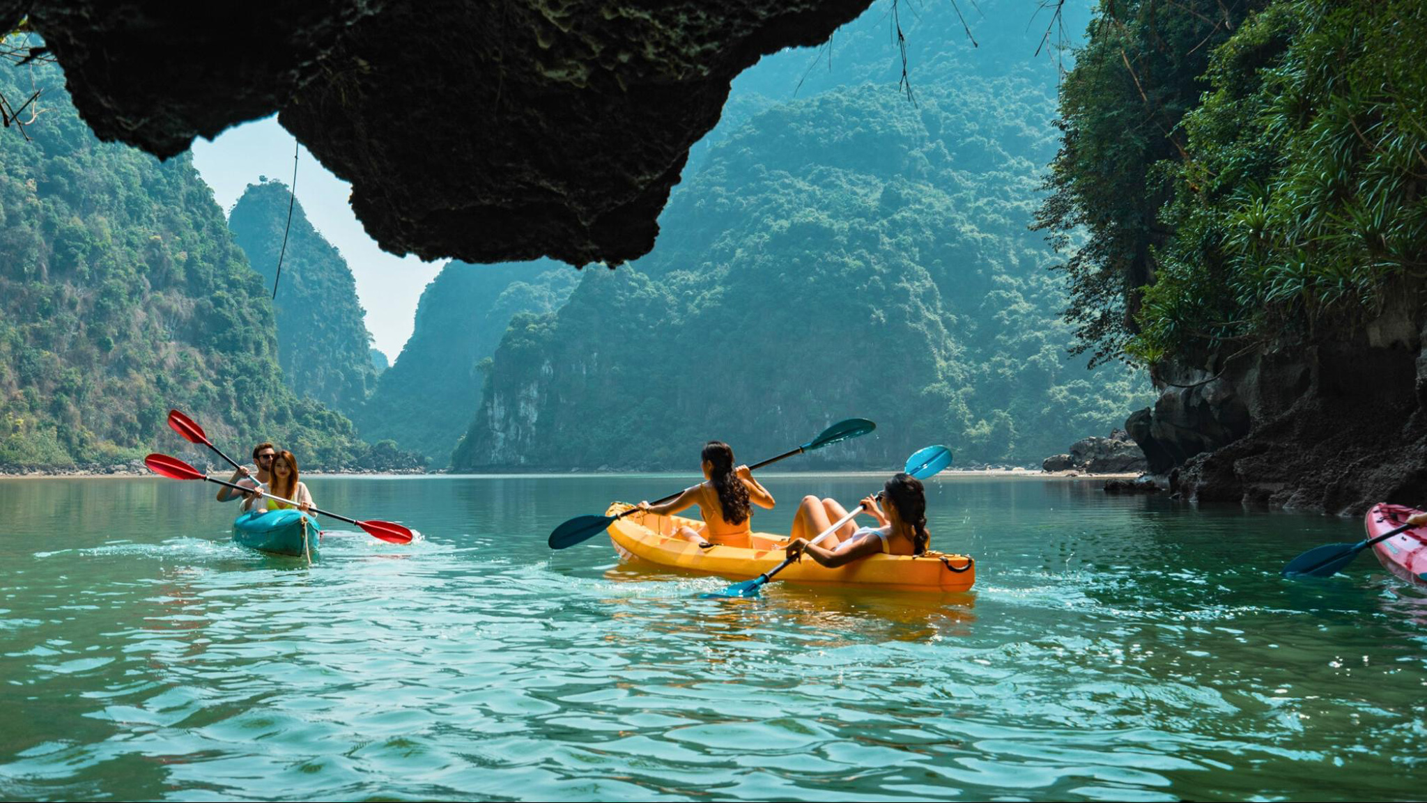 Kayak through breathtaking limestones in Ha Long Bay