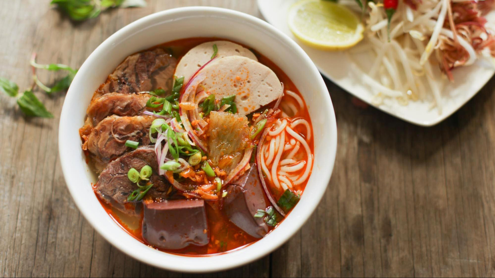 Savore the rich and spicy flavors of Bun Bo Hue