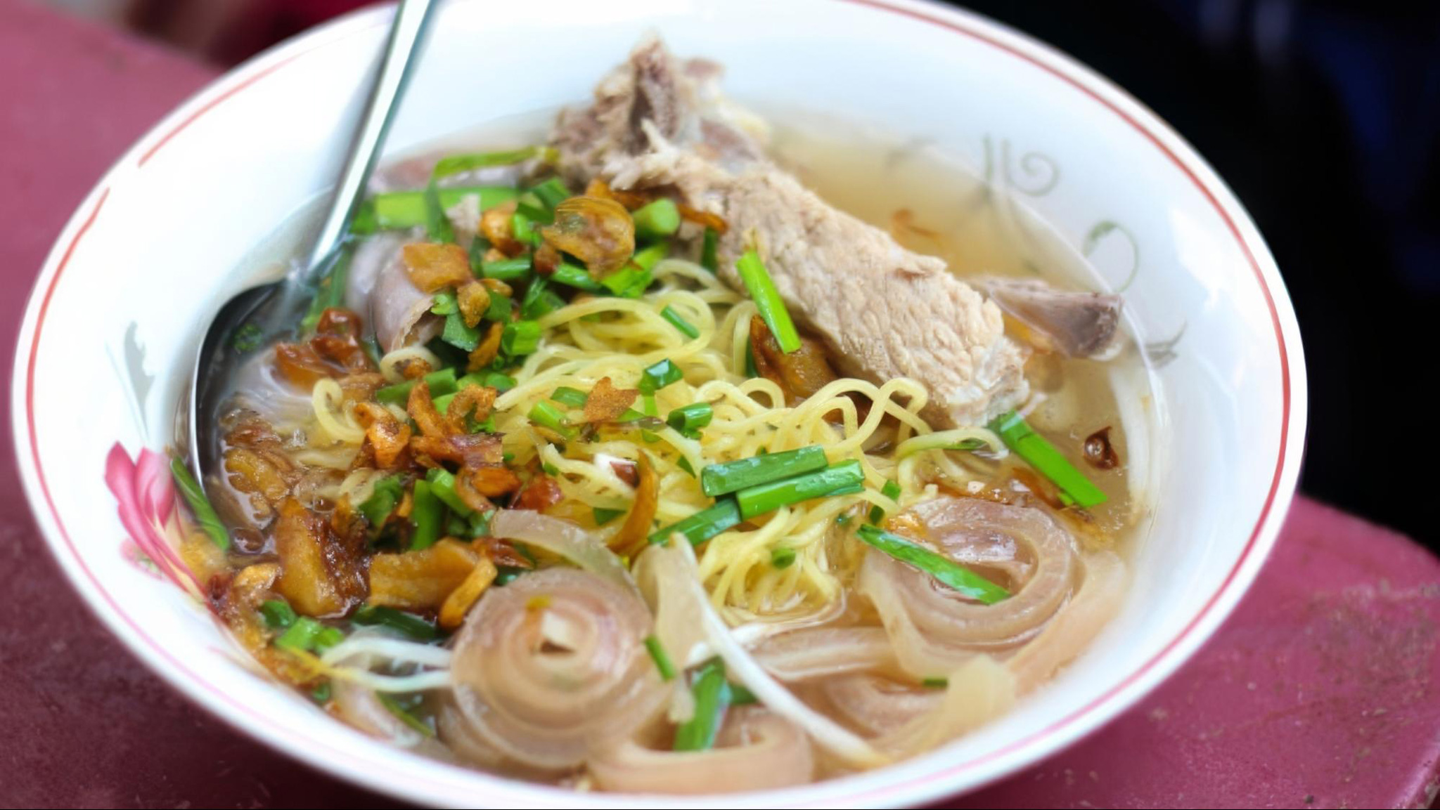 Hu Tieu Go combines savory broth, tender noodles, and fresh herbs perfectly