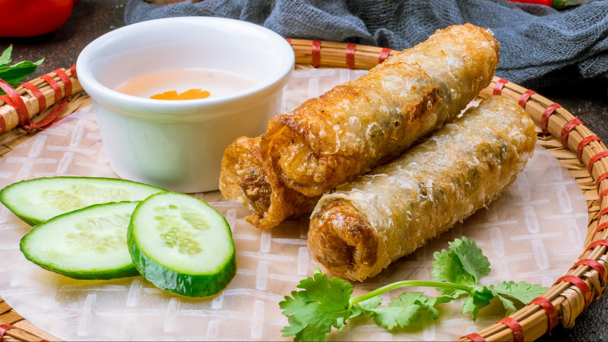 Nem Ran delights with crispy wrappers, savory fillings, and fresh herbs