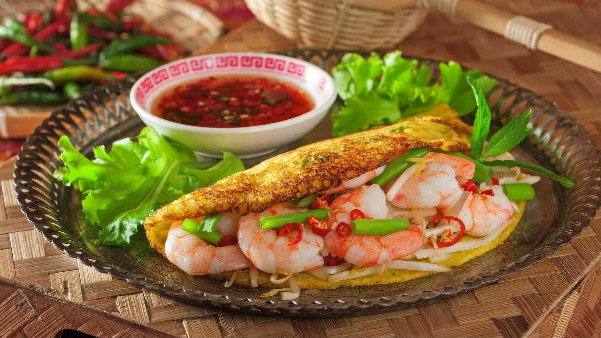 Banh Xeo is crispy, golden, and filled with savory shrimp and pork