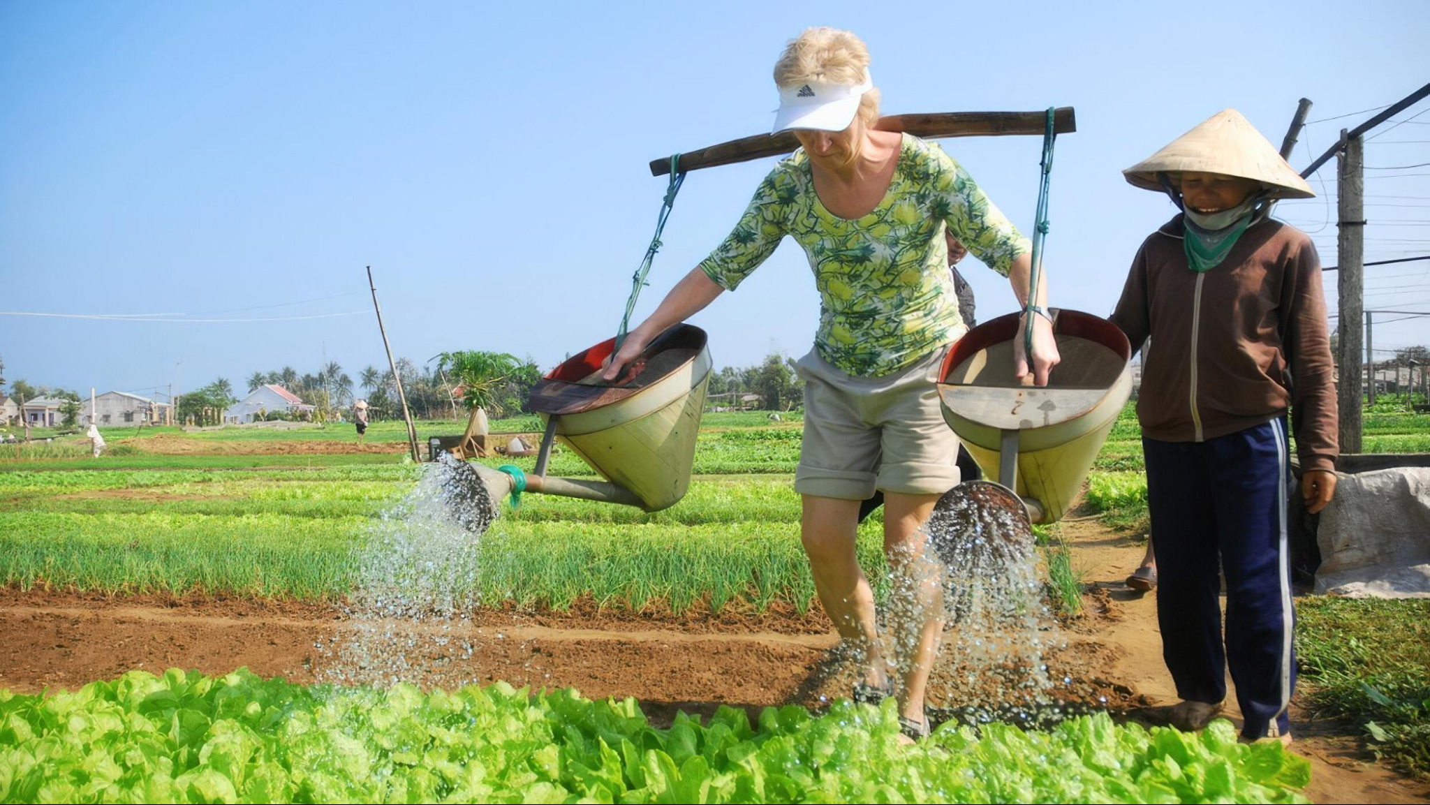 Try your hand at traditional vegetable farming in Tra Que Village