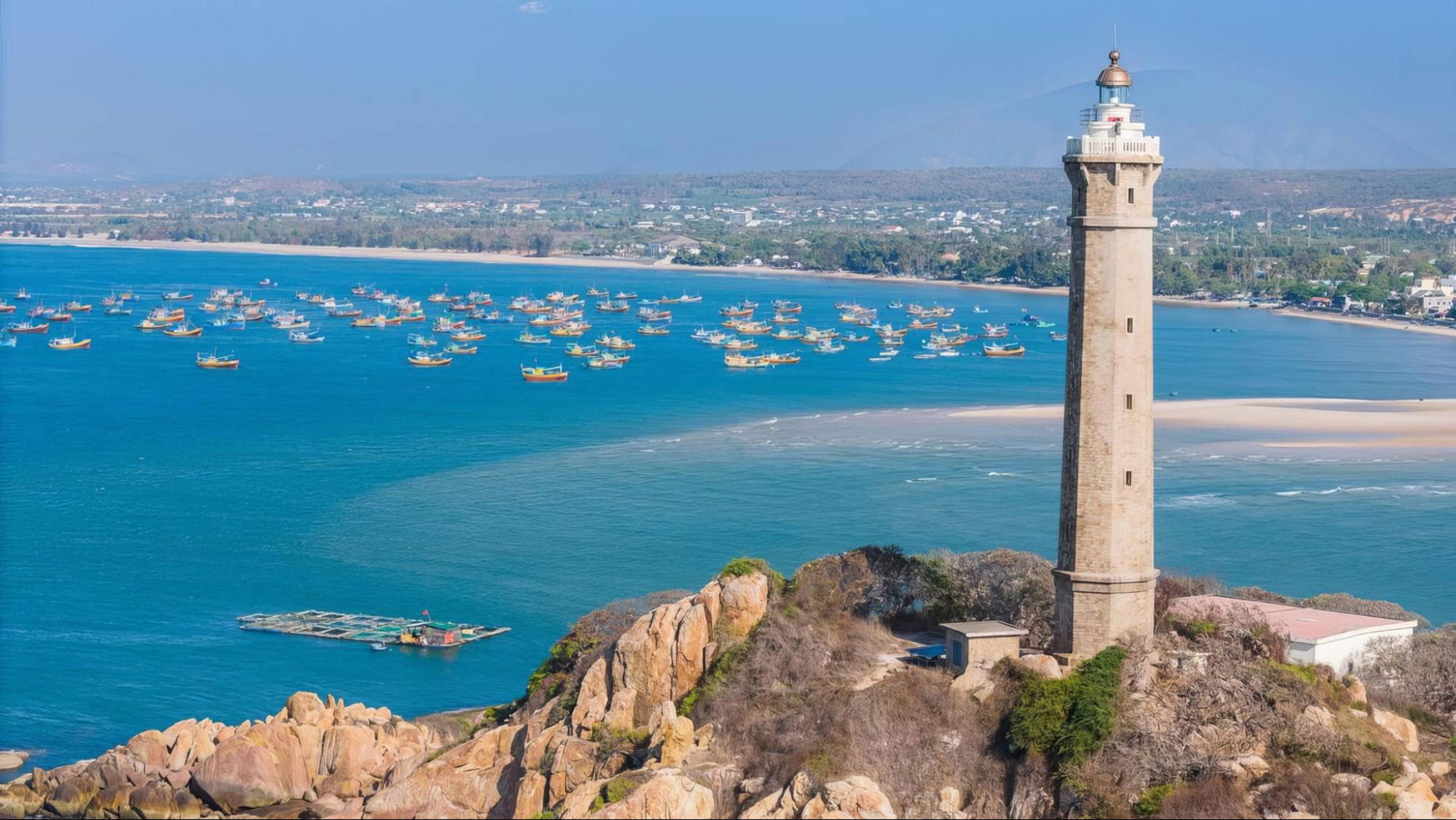Ke Ga Lighthouse stands tall on a rocky islet, offering panoramic sea views