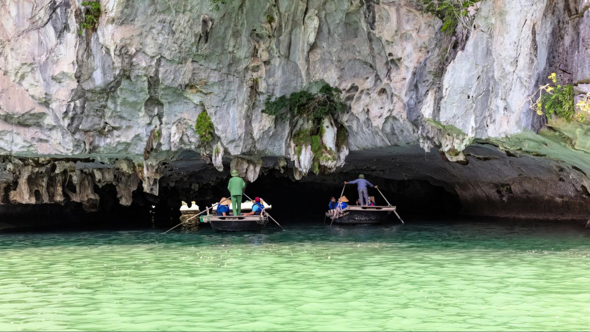 The Dark and Bright Cave captivates visitors with its breathtaking, millennia-old stalactites