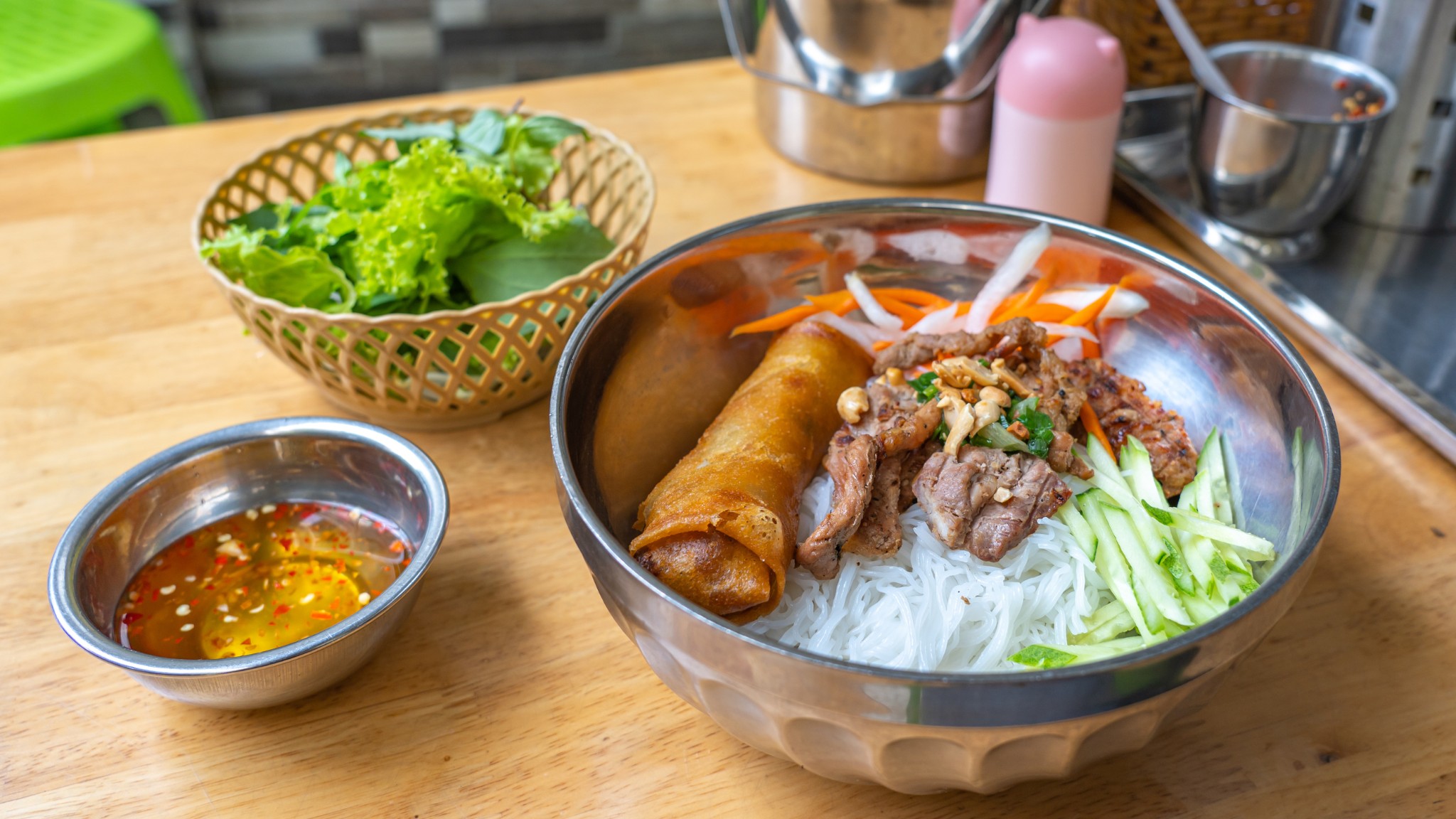 Grilled pork over fresh vermicelli is a flavorful and nutritious choice in Saigon&rsquo;s pleasant November weather