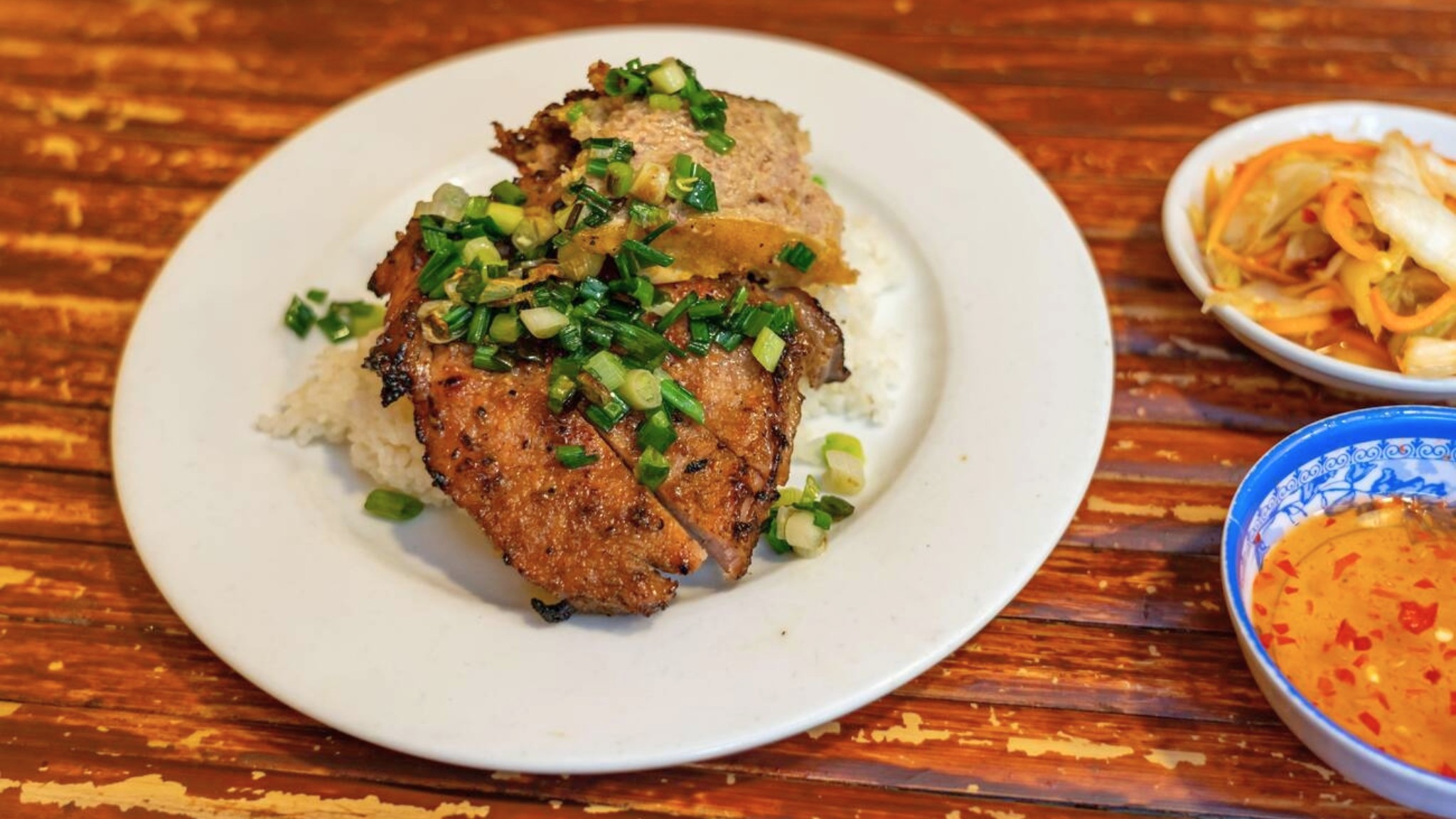 Com Tam is a beloved Saigon dish, perfect for enjoying outdoors on a cool November morning