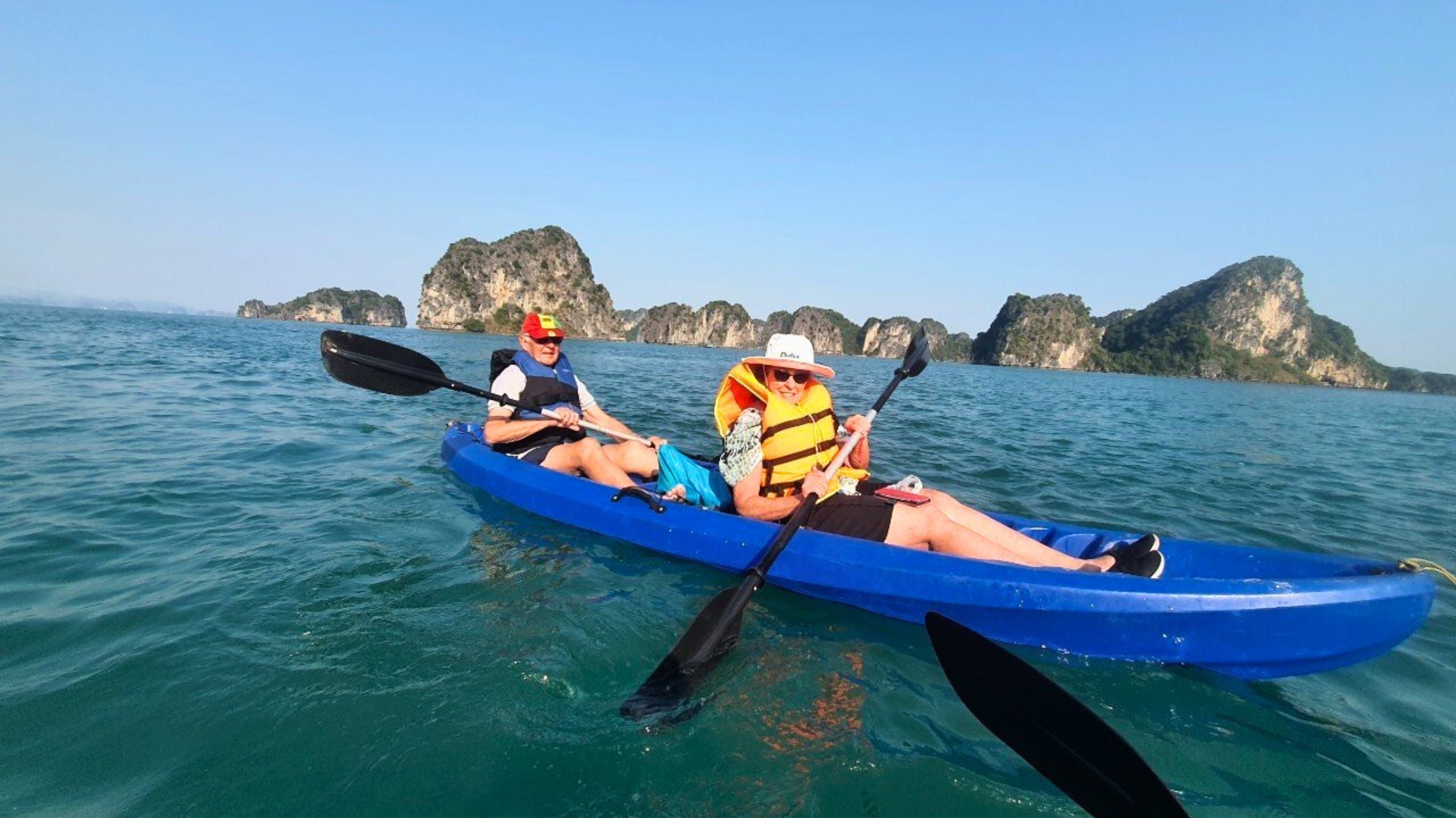 Kayak Through The Serene Waters Of Lan Ha Bay And Admire Towering Limestone Cliffs
