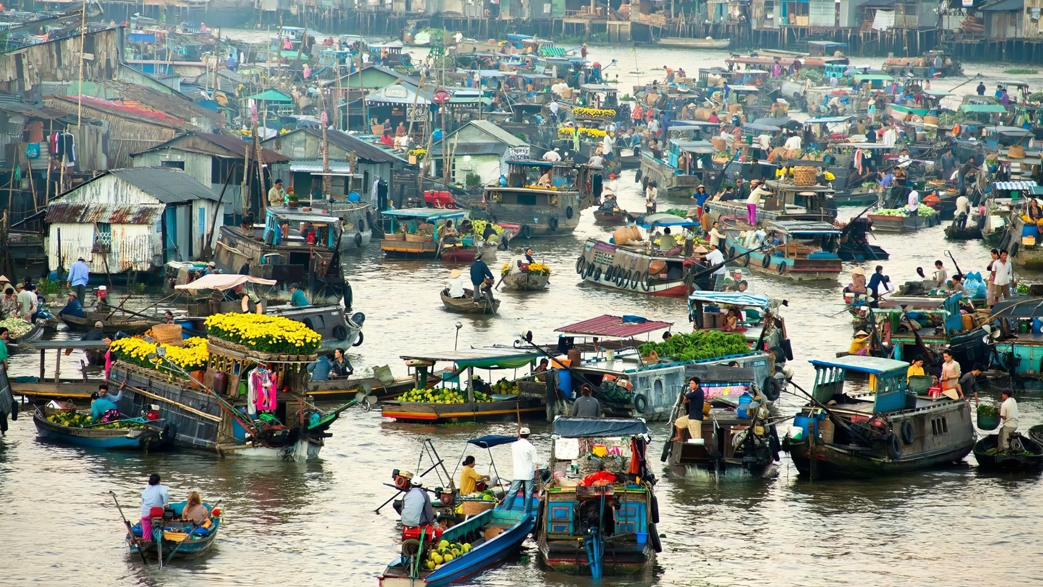Boats Packed With Fruits And Local Goods In Cai Rang Floating Market