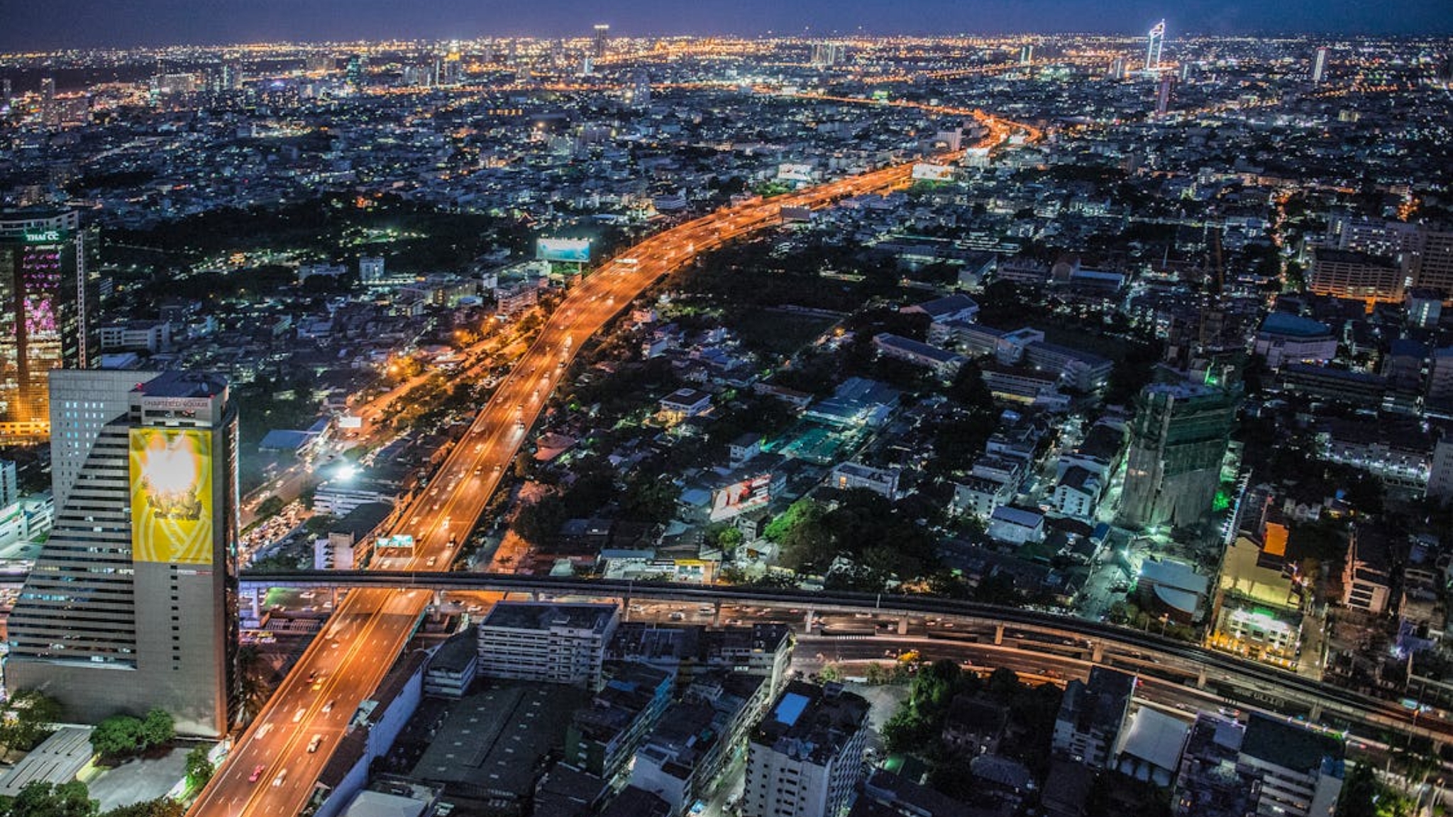 Vibrant Bangkok City With Bustling Streets And Bright Lights