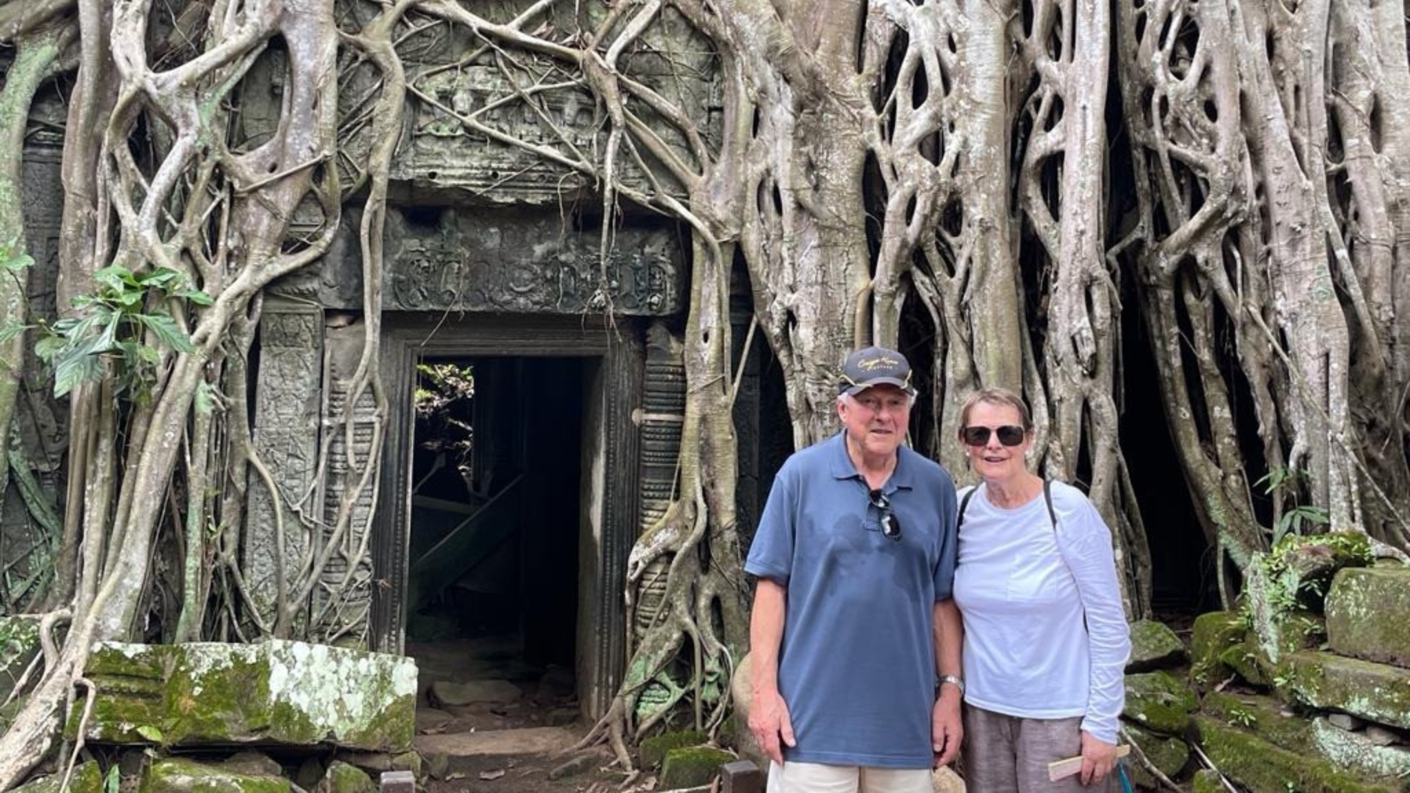 The Mysterious Ta Prohm Temple With Its Ancient Roots Entwined In Jungle Trees