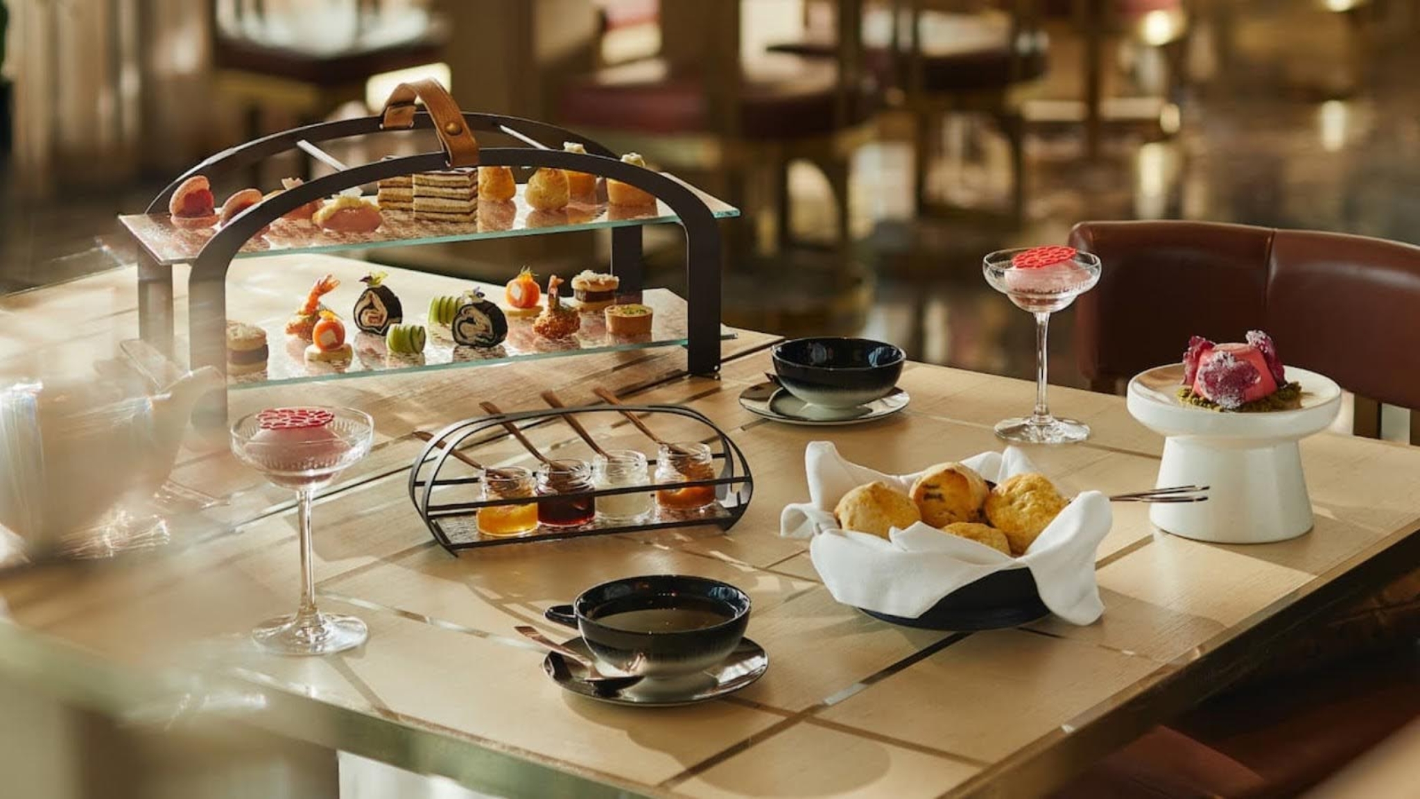 A Luxurious Table Setting With Elegantly Arranged Pastries At The Hudson Rooms Restaurant