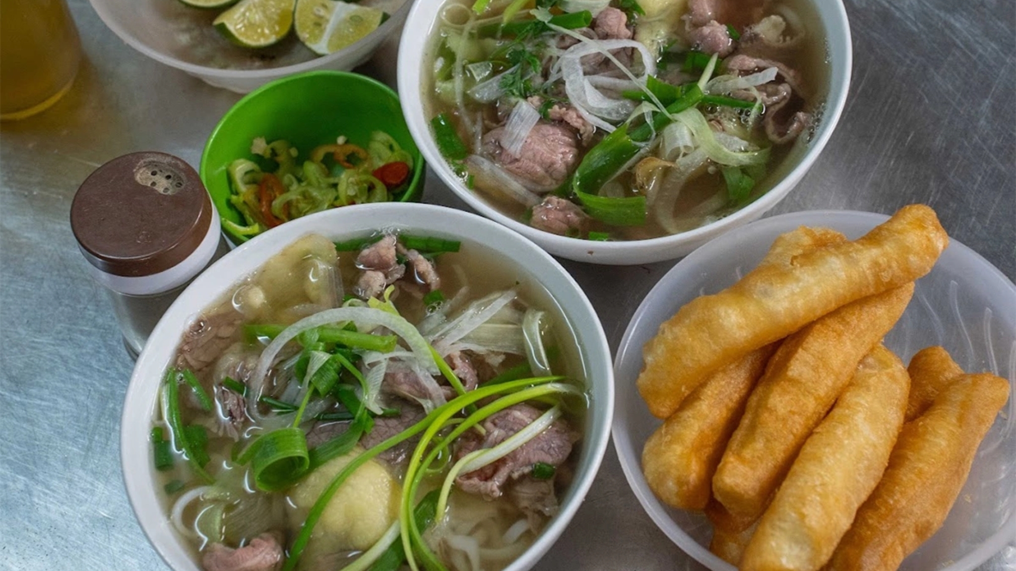 Tasty Traditional Vietnamese Beef Noodle Soup With Crispy Fried Dough Sticks