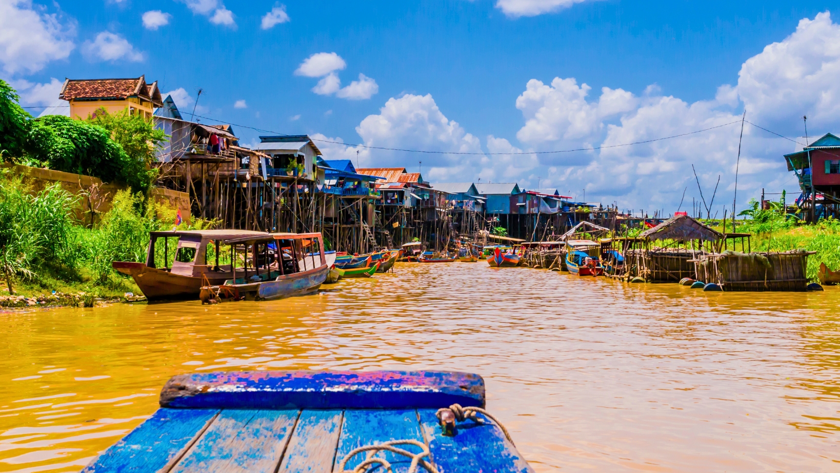 Colorful Houses On Stilts At Kampong Phluk Floating Village