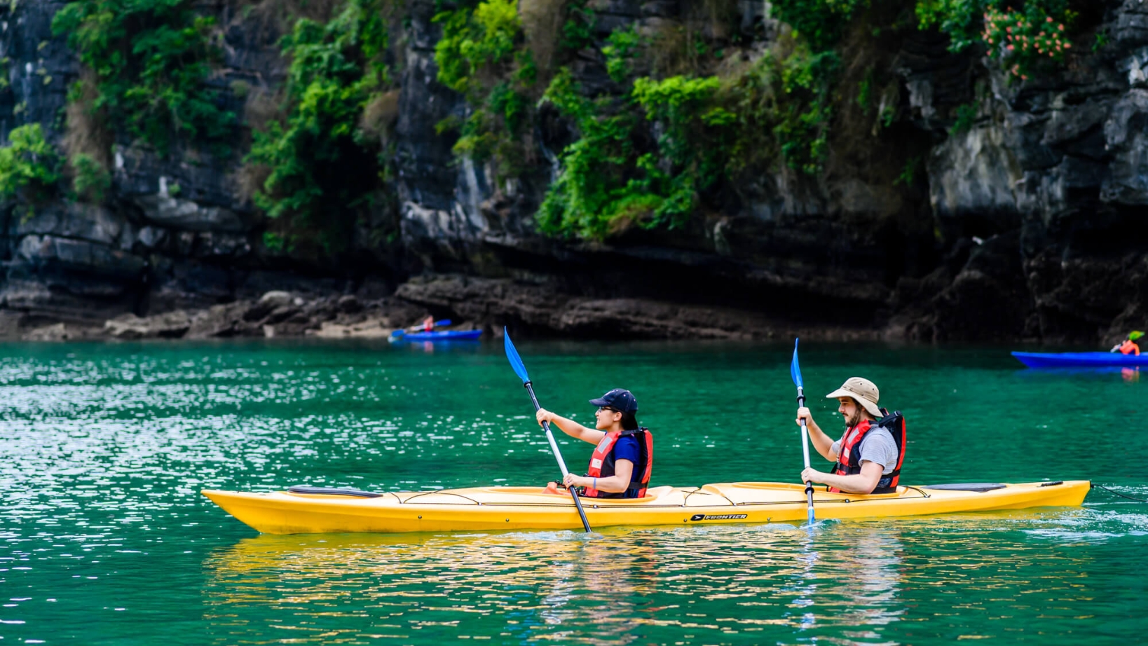Kayak Through Emerald Waters Of Halong Bay
