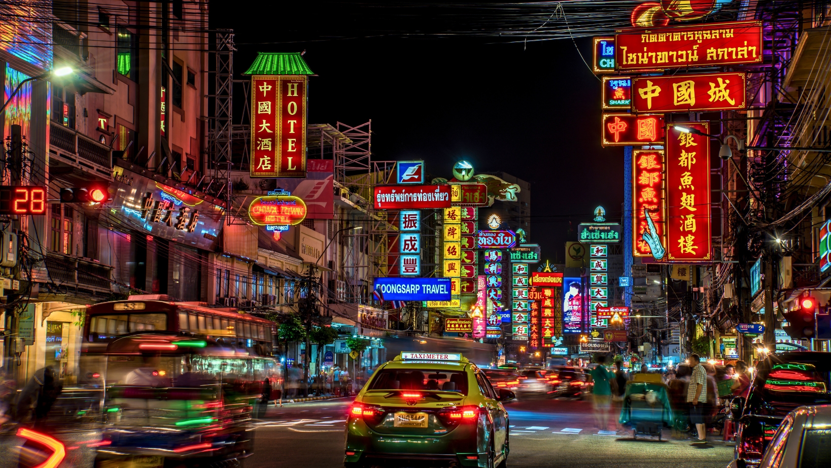 Vibrant Bangkok City With Bustling Streets And Bright Lights