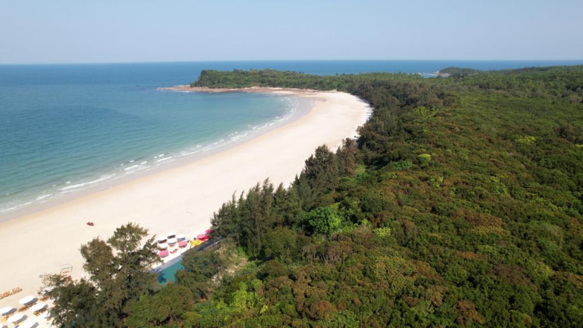 White sand and turquoise waters at Minh Chau Beach on Quan Lan Island, Van Don