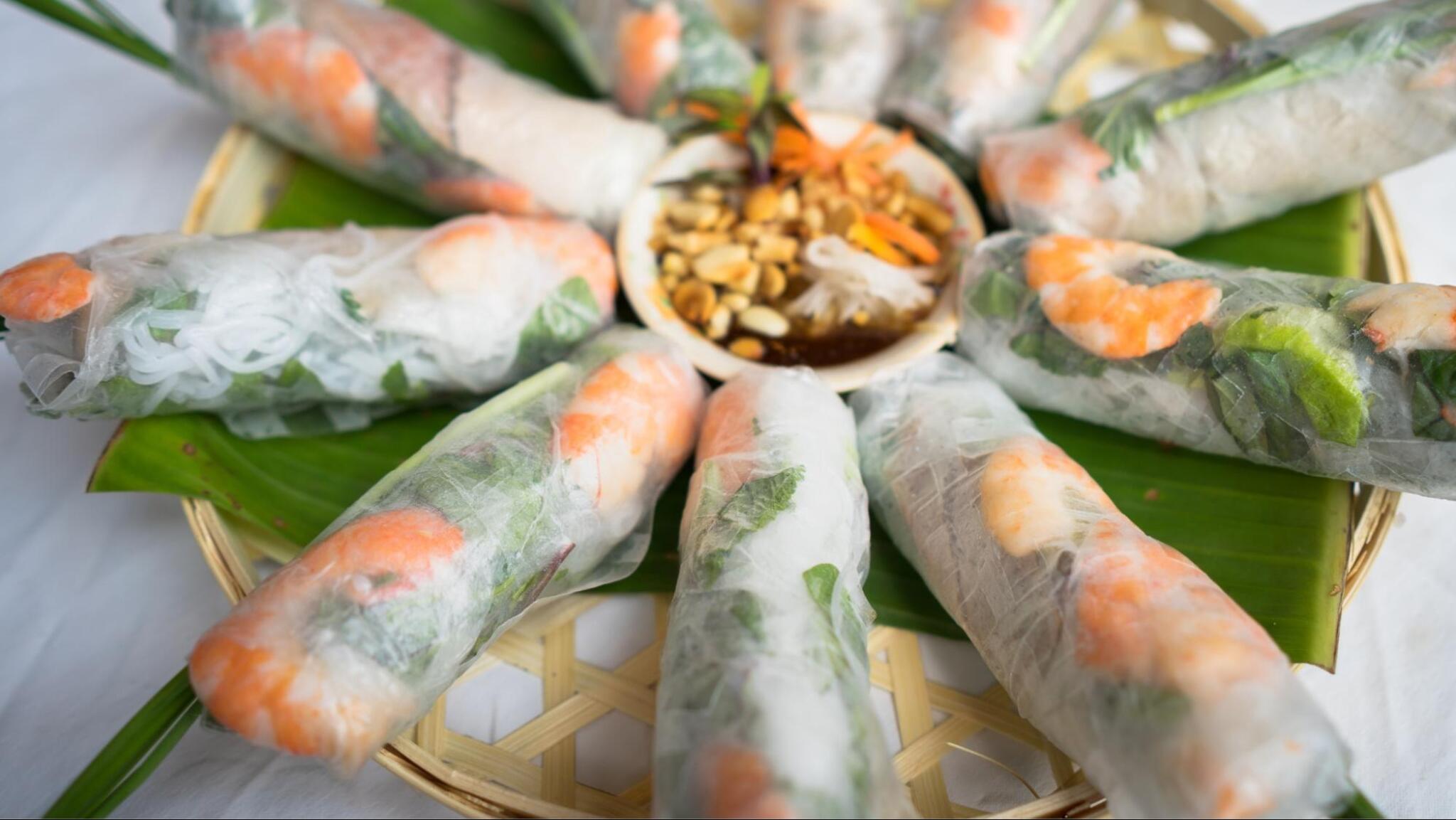 Rice paper rolls with shrimp, pork, vegetables, rice noodles, and dipping sauce