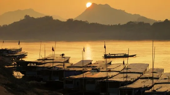 Admire The Stunning Sunset Along The Riverside