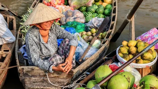 Observe The Busy Trading Of People At Thom Coconut Floating Market