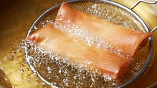Fry Golden Spring Rolls Until Crispy And Delicious