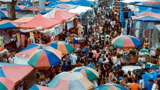 Discover Local Life At A Crowded And Colorful Market Day