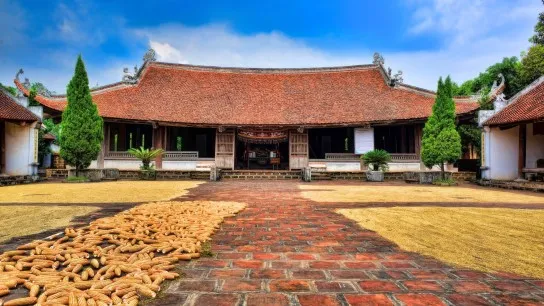 Admire Ancient Mong Phu Communal House Surrounded By Tradition
