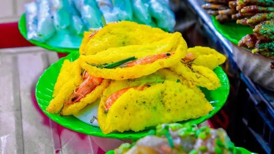 Enjoy Crunchy Vietnamese Pancakes Bursting With Flavor And Local Delicacies