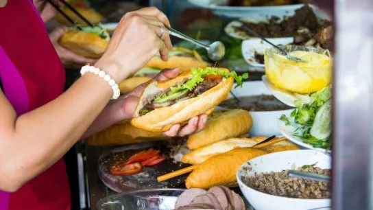 Day 1 Savor Crispy Vietnamese Banh Mi Filled With Flavorful Meat, Pickles, And Herbs
