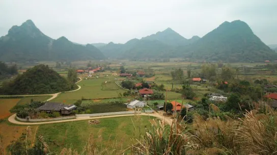 Day 9 Witness The Impressive Silhouette Of Mau Son Mountain Amid Vast Green Landscapes