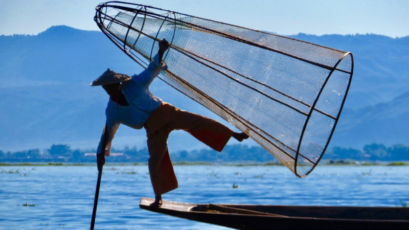 Leg Rowing Fishermen