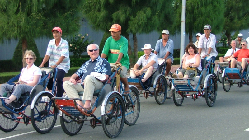 Tourists Start Their Food Tour By Cyclo