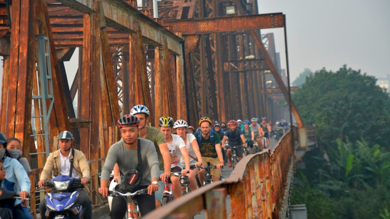 Travel Through The Ancient Long Bien Bridge