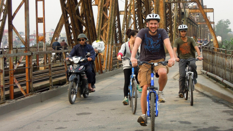Ride Across The Ancient Long Bien Bridge