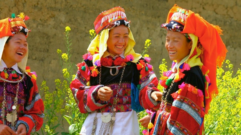 Watch The Locals Wearing Different Vibrant Color Costumes