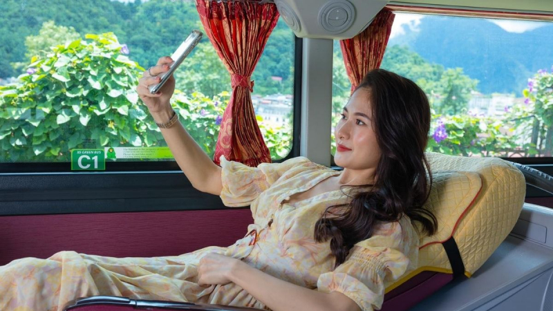 Passenger Relaxing On The Sleeper Bus